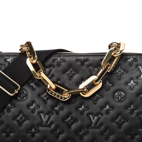 black embossed louis vuitton.